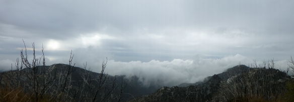 View west from San Gabriel Peak at 2:00 pm with  the clouds having overtaken Brown Mountain and Mt. Lukens from below as the clouds from above make it over me on San Gabriel Peak and it begins to sprinkle shortly thereafter.  